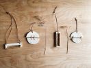 Horizontal Wall Hanging | Wall Sculpture in Wall Hangings by Bridget Dorr. Item composed of ceramic and leather
