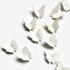 Set of 25 Botanical Butterflies wall sculpture artwork | Wall Hangings by Elizabeth Prince Ceramics. Item composed of ceramic in minimalism or mid century modern style