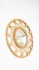 Handmade 23.5 Round Boho Rattan Hanging Mirror | Decorative Objects by Amara. Item composed of wood in boho or minimalism style