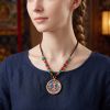 Akasagarbha Thangka Pendant Ox Tiger Zodiac Amulet Art | Ornament in Decorative Objects by Dynasty Artisan. Item composed of metal in contemporary or eclectic & maximalism style