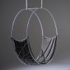 Studio Stirling Circular Wheel Chair in the POD Hotel | Swing Chair in Chairs by Studio Stirling | POD Camps Bay in Cape Town. Item composed of steel in minimalism or contemporary style