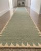 Handwoven Woolen Green Runner Rug | Rugs by Evergreen Carpets. Item made of wool works with boho & minimalism style