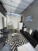 Studio Stirling Nest Egg in Private Home in Cape Town | Swing Chair in Chairs by Studio Stirling. Item made of steel works with minimalism & contemporary style