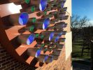 Nebraska Time | Clock in Decorative Objects by Ansen Seale | Wayne State College in Wayne. Item made of metal