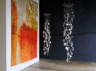 Light Rain Installation | Chandeliers by Umbra & Lux | Salari Fine Carpets in Vancouver. Item composed of glass