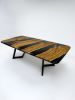 Black Olive Wood Epoxy Resin River Dinner Table - Live Edge | Dining Table in Tables by Tinella Collection. Item composed of wood & brass compatible with minimalism and art deco style
