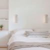 Riverine coastal wall sconce (up and down light function) | Sconces by Light and Fiber. Item composed of cotton and metal in boho or contemporary style