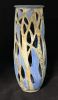 Cylindrical Cut Out Vase With Tree Motif | Floral Arrangements by Sheila Blunt. Item composed of stoneware
