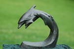 Dolphin Family | Public Sculptures by Jim Sardonis | Fairhope in Fairhope. Item made of bronze with stone