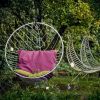 Bubble Hanging Swing Chair - Pink and Green Cushions | Chairs by Studio Stirling | Ten Stirling Bed and Breakfast in Johannesburg. Item made of steel works with minimalism & modern style