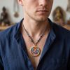 Tibetan Yellow Jambhala Thangka Wealth Amulet Pendant | Ornament in Decorative Objects by Dynasty Artisan. Item composed of metal in contemporary or eclectic & maximalism style