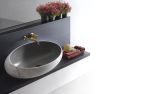 Gong Washbasin | Water Fixtures by Kreoo. Item composed of marble