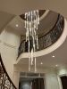 Ferraro Long Staircase Chandelier in hand-blown glass | Chandeliers by Galilee Lighting. Item made of glass