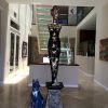 Madame in Bloom | Public Sculptures by Glass Mosaic Master | Fallbrook Public Library in Fallbrook. Item composed of wood & glass