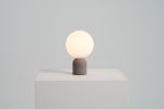 CASTLE GLO Table Lamp | Lamps by SEED Design USA. Item composed of concrete and glass