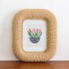 Nessie Rattan Photo Frame | Decorative Frame in Decorative Objects by Hastshilp. Item composed of wood