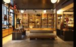 Perimeter Shelving System | Storage by Amuneal | Cole Haan in New York. Item composed of wood and metal