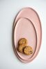 Handmade Oval Porcelain Serving Platter. Pink | Serveware by Creating Comfort Lab. Item composed of ceramic