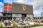 Custom Chairs and Barstools for Guinness | Bar Stool in Chairs by Greg Sheres | Guinness Open Gate Brewery in Halethorpe. Item made of wood & fabric