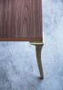 Cast Bronze and Wood Dining Table from Costantini, Enzio | Tables by Costantini Design. Item made of walnut with bronze