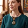 Medicine Buddha Thangka Gold Pendant Vitality Amulet Pedant | Ornament in Decorative Objects by Dynasty Artisan. Item composed of metal compatible with contemporary and eclectic & maximalism style