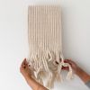 Soft Drifts | Macrame Wall Hanging in Wall Hangings by YASHI DESIGNS. Item made of oak wood with cotton works with minimalism & contemporary style