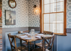 Custom dining tables and cafe tables for restaurant | Tables by Urban Wood Goods | Nantucket Island in Nantucket. Item composed of wood and steel