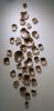 Wall Sculpture, 30 Pieces Set, Obvara Finish, Porcelain | Wall Hangings by SevaCeramics. Item composed of ceramic