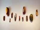 painted driftwood | Wall Hangings by Cathy Liu. Item composed of wood