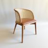 Vera Woven Rattan Back Dining Chair | Chairs by Kleinhaus Furniture. Item made of wood with fabric works with boho & mid century modern style