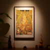 Yunjin Silk Brocade Yellow Dzambhala Thangka Art | Embroidery in Wall Hangings by Dynasty Artisan. Item composed of wood and fabric in contemporary or eclectic & maximalism style