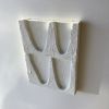‘Cede’ | Wall Sculpture in Wall Hangings by Greyya Jay. Item made of wood with cement