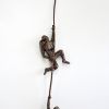 Metal wall art sculpture, SET of 2 miniature climbing men | Sculptures by NUNTCHI. Item made of metal works with art deco style