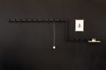 Coatrack by the meter, 3D laser cut metal tube with wardrobe hooks. Customizable till 6 meters. | Hardware by Maarten Baptist. Item composed of metal