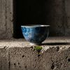 Heritage Wood-fired Porcelain Tea/Coffee Bowl Fish at Play | Decorative Bowl in Decorative Objects by Dynasty Artisan. Item composed of ceramic compatible with eclectic & maximalism and asian style