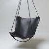 Modern Butterfly Swing Lounge Chair in Black | Swing Chair in Chairs by Studio Stirling. Item made of steel with leather works with boho & minimalism style