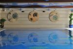 Ammonite & Belemnite Disks | Wall Sculpture in Wall Hangings by ARCHIGLASS by Urbanowicz | Centuria Hotel&Natural SPA in Ogrodzieniec. Item made of glass compatible with contemporary and japandi style