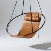 Studio Stirling Soft Ochre Leather Sling Chair in Vienna | Swing Chair in Chairs by Studio Stirling. Item composed of steel and leather in minimalism or coastal style