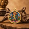 Premium Manjushri Thangka Pendant Zodiac Rabbit Amulet | Ornament in Decorative Objects by Dynasty Artisan. Item composed of metal in contemporary or eclectic & maximalism style