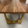 Brass inlay tunnel table | Dining Table in Tables by YJ Interiors. Item made of walnut with brass works with mid century modern & contemporary style