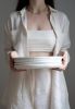 Handmade Porcelain Dinner Plates. Off-white With Strokes | Dinnerware by Creating Comfort Lab. Item composed of ceramic