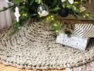 Knitted Christmas tree skirt in champagne color | Small Rug in Rugs by Anzy Home. Item composed of cotton