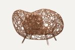 Bubbler Rattan Lounge Chair | Chairs by Monarca Goods. Item composed of wood and fiber in boho or contemporary style