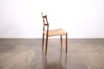 Carved Wood Dining Chair with Woven Rush Seat by Costantini | Chairs by Costantini Design. Item composed of oak wood