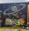 Bring Back Pluto | Street Murals by ESOTERiC Calligraffiti. Item made of synthetic