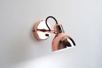 Laito Mini Wall Sconce | Sconces by SEED Design USA. Item composed of steel