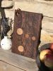 Black Walnut Burl Board with circle inlays | Serveware by Patton Drive Woodworking. Item composed of walnut