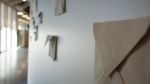To/From | Wall Sculpture in Wall Hangings by Lauren Herzak-Bauman | American Greetings Corporation in Westlake. Item made of ceramic