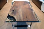 Walnut with epoxy inlay table | Dining Table in Tables by Abodeacious. Item made of walnut with steel works with contemporary & industrial style