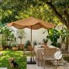 A large natural-fiber patio umbrella with a black base stan | Ornament in Decorative Objects by GoldencoirVietNam LLC. Item made of wood with fiber works with boho & country & farmhouse style